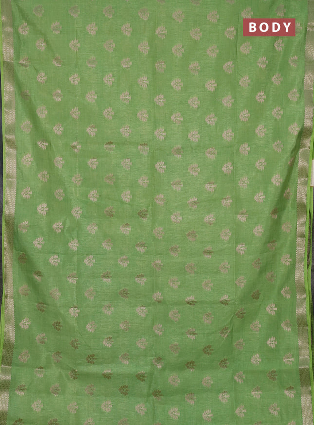 Semi raw silk saree light green with allover zari woven buttas and zari woven border