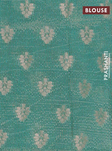 Semi raw silk saree teal green with allover zari woven buttas and zari woven border