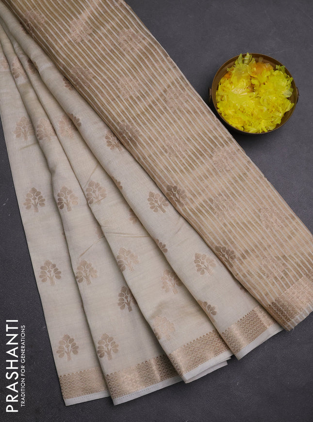 Semi raw silk saree cream with allover zari woven buttas and zari woven border