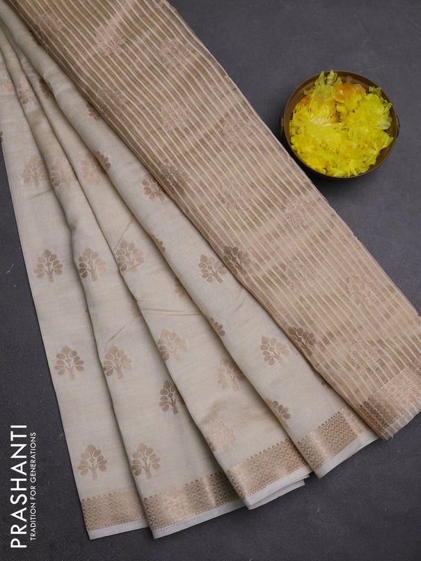 Semi raw silk saree cream with allover zari woven buttas and zari woven border