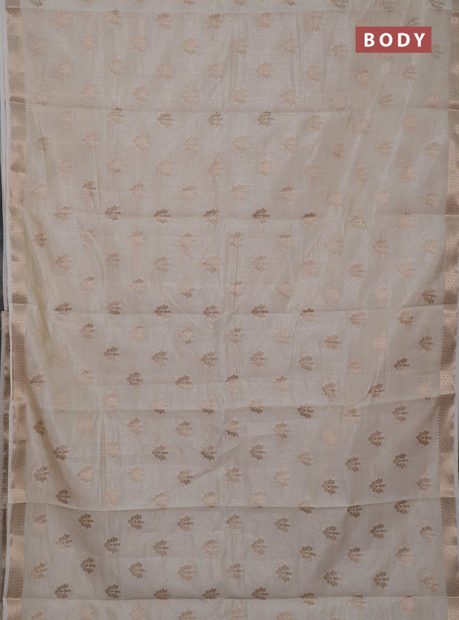 Semi raw silk saree cream with allover zari woven buttas and zari woven border