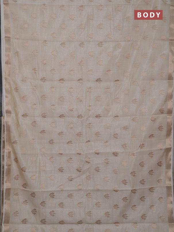 Semi raw silk saree cream with allover zari woven buttas and zari woven border