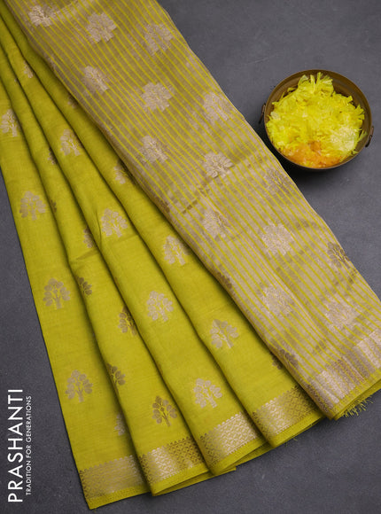 Semi raw silk saree lime green with allover zari woven buttas and zari woven border