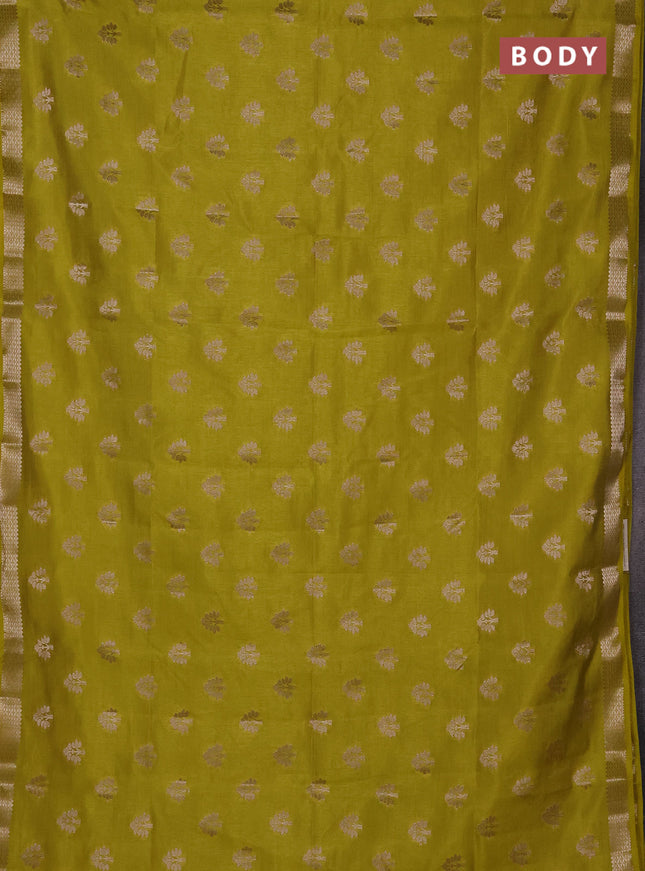 Semi raw silk saree lime green with allover zari woven buttas and zari woven border