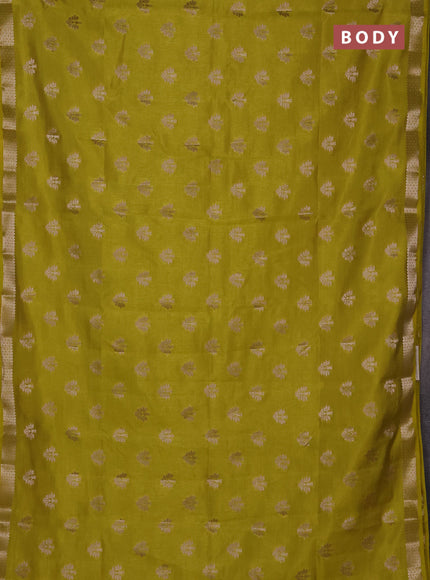 Semi raw silk saree lime green with allover zari woven buttas and zari woven border