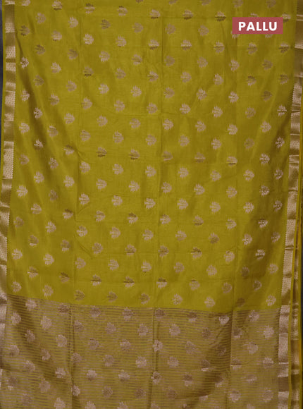 Semi raw silk saree lime green with allover zari woven buttas and zari woven border