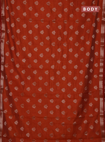 Semi raw silk saree rustic orange with allover zari woven buttas and zari woven border