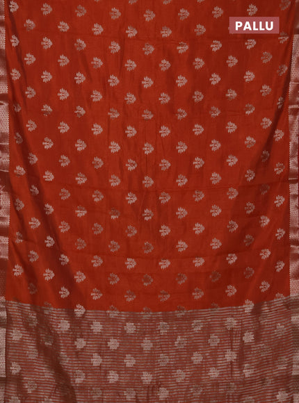 Semi raw silk saree rustic orange with allover zari woven buttas and zari woven border