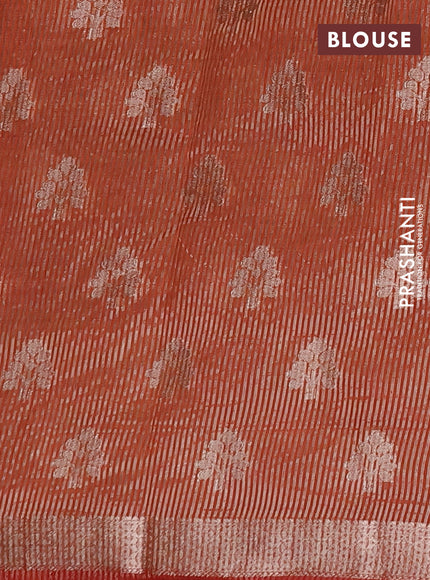 Semi raw silk saree rustic orange with allover zari woven buttas and zari woven border