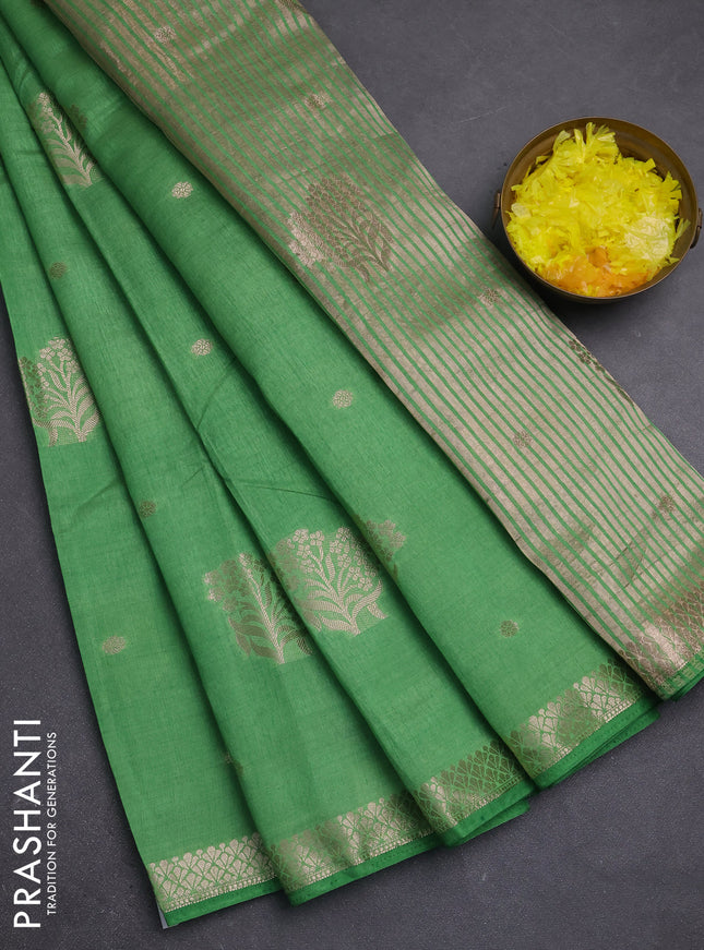 Semi raw silk saree green with zari woven buttas and zari woven border