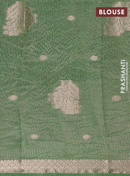 Semi raw silk saree green with zari woven buttas and zari woven border