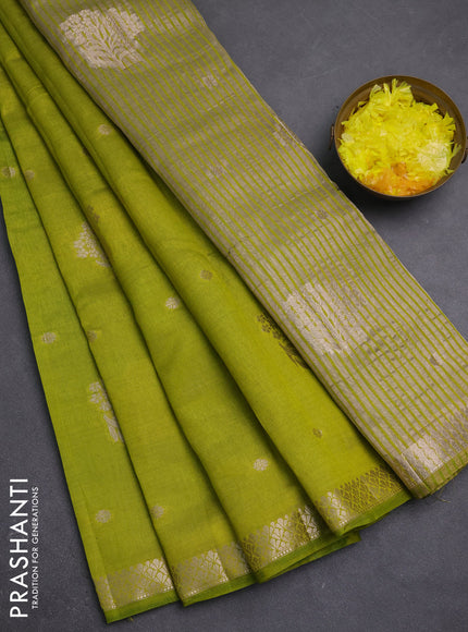 Semi raw silk saree light green with zari woven buttas and zari woven border