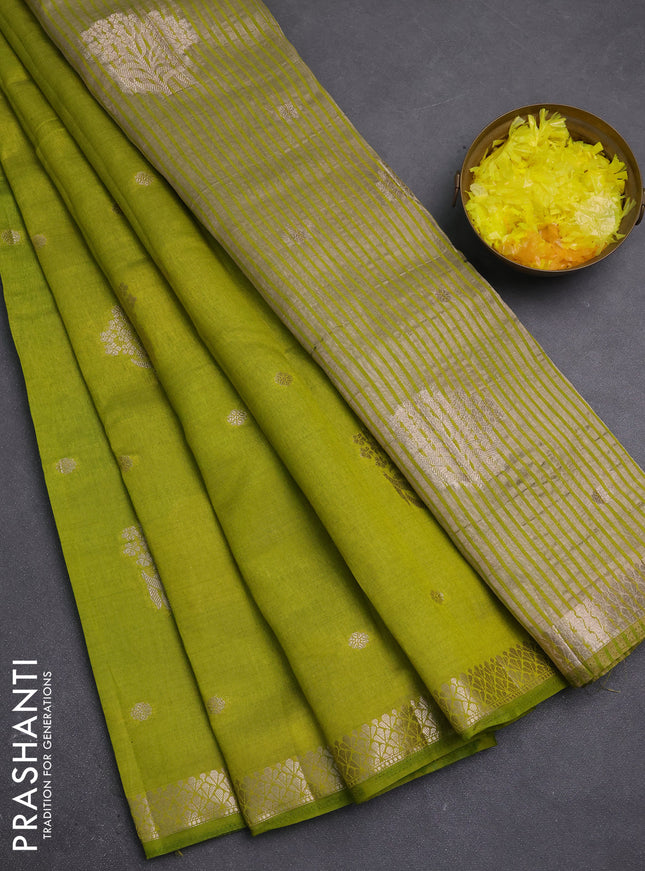 Semi raw silk saree light green with zari woven buttas and zari woven border