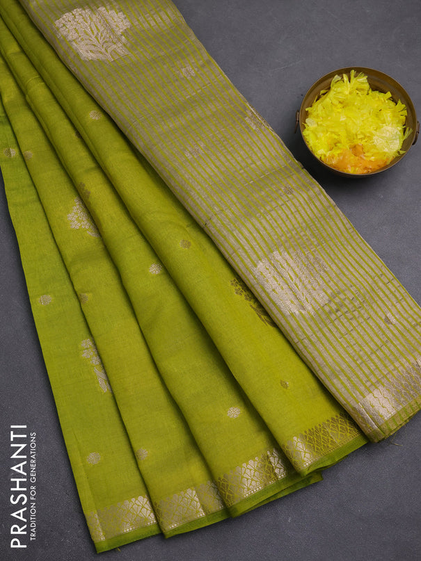 Semi raw silk saree light green with zari woven buttas and zari woven border