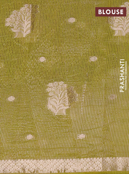 Semi raw silk saree light green with zari woven buttas and zari woven border