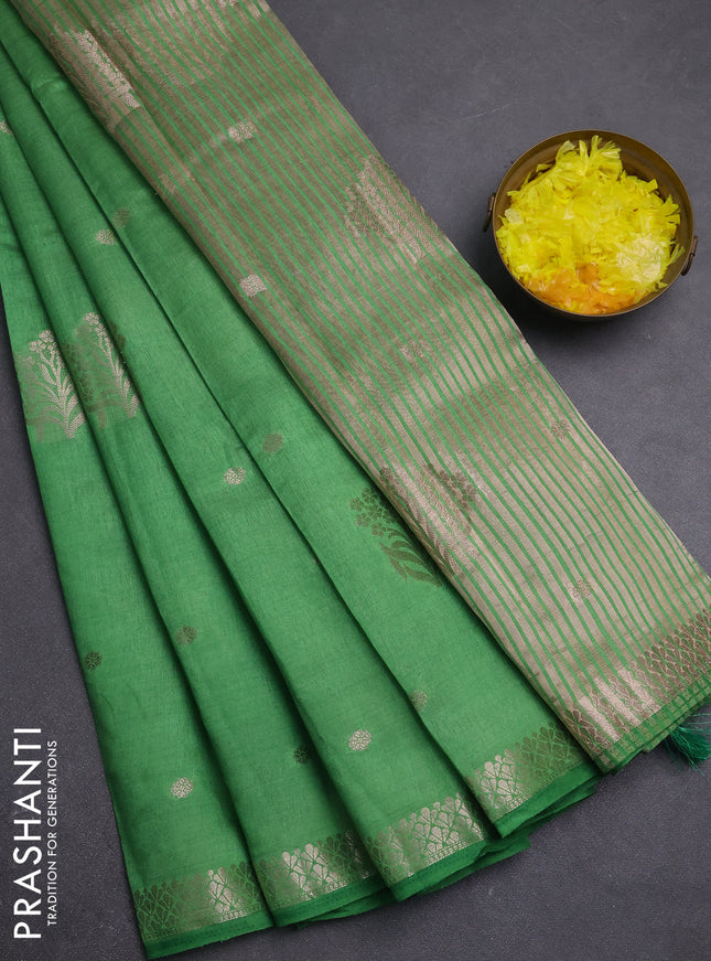 Semi raw silk saree green with zari woven buttas and zari woven border