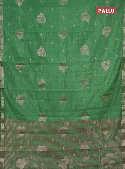 Semi raw silk saree green with zari woven buttas and zari woven border