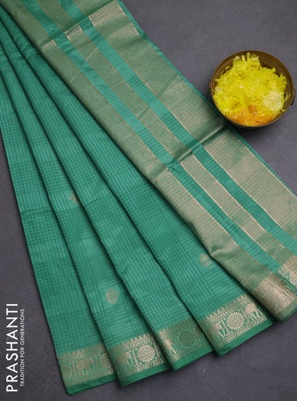Semi raw silk saree pastel green with zari woven buttas and zari woven border