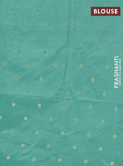 Semi raw silk saree pastel green with zari woven buttas and zari woven border
