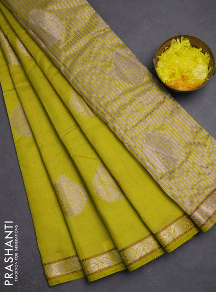 Semi raw silk saree lime green with zari woven buttas and zari woven border