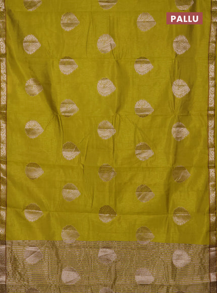Semi raw silk saree lime green with zari woven buttas and zari woven border