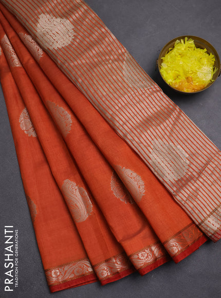 Semi raw silk saree rust shade with zari woven buttas and zari woven border
