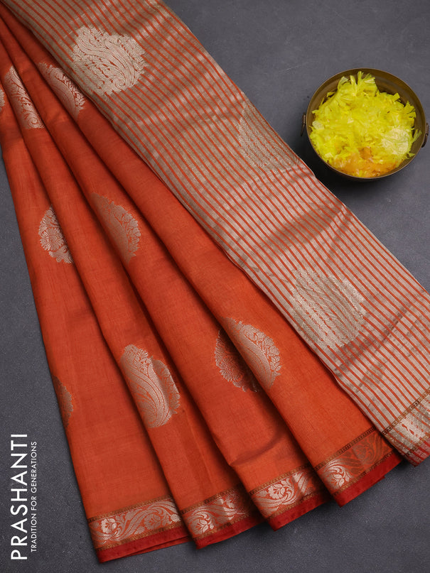 Semi raw silk saree rust shade with zari woven buttas and zari woven border