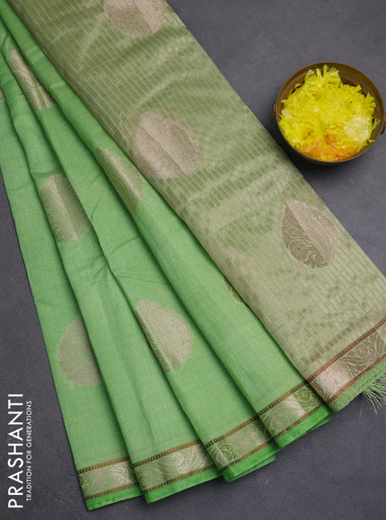 Semi raw silk saree light green with zari woven buttas and zari woven border