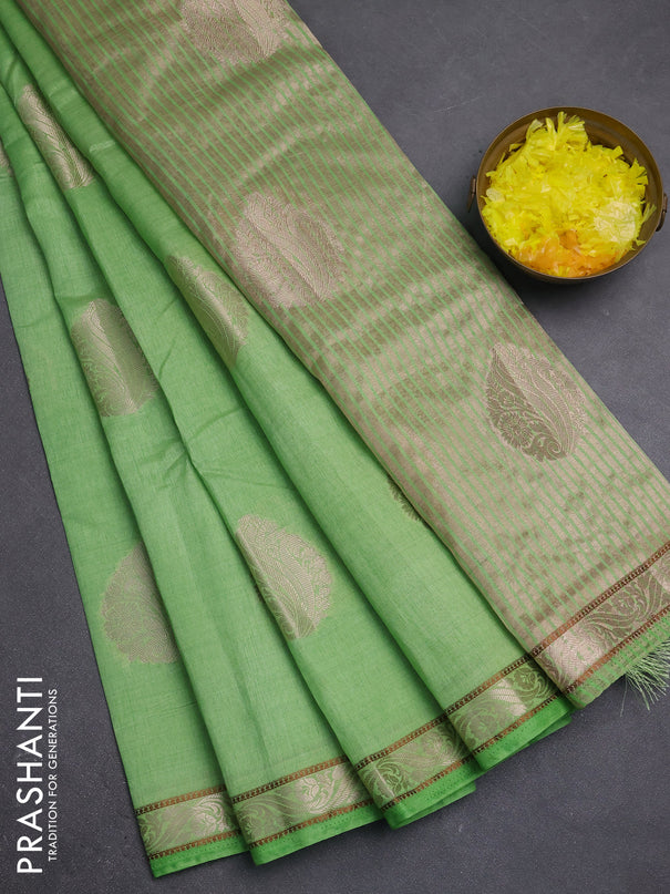 Semi raw silk saree light green with zari woven buttas and zari woven border
