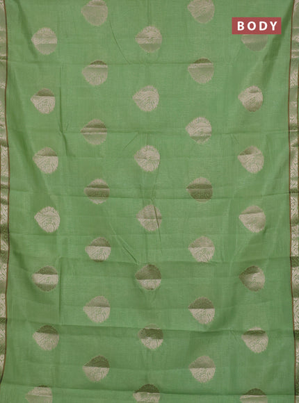 Semi raw silk saree light green with zari woven buttas and zari woven border
