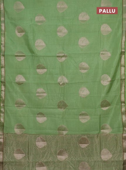 Semi raw silk saree light green with zari woven buttas and zari woven border