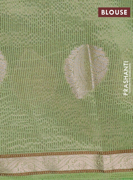 Semi raw silk saree light green with zari woven buttas and zari woven border