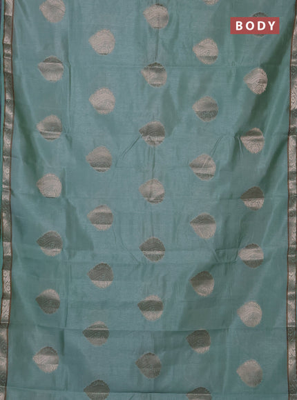 Semi raw silk saree pastel green with zari woven buttas and zari woven border