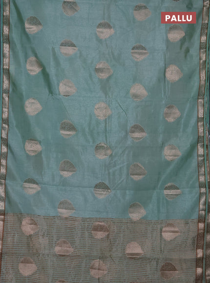 Semi raw silk saree pastel green with zari woven buttas and zari woven border