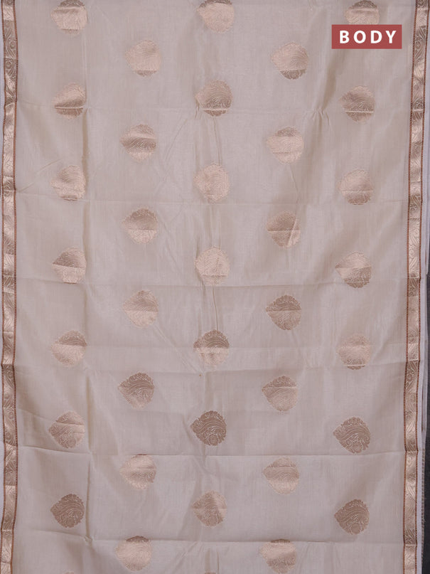 Semi raw silk saree cream with zari woven buttas and zari woven border