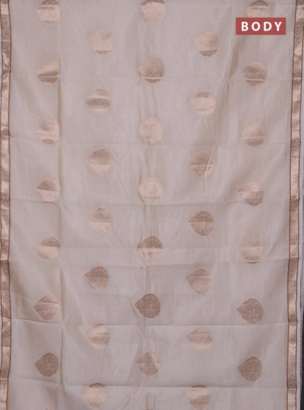 Semi raw silk saree cream with zari woven buttas and zari woven border