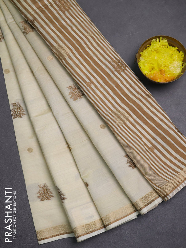 Semi raw silk saree cream with thread & zari woven buttas and zari woven border