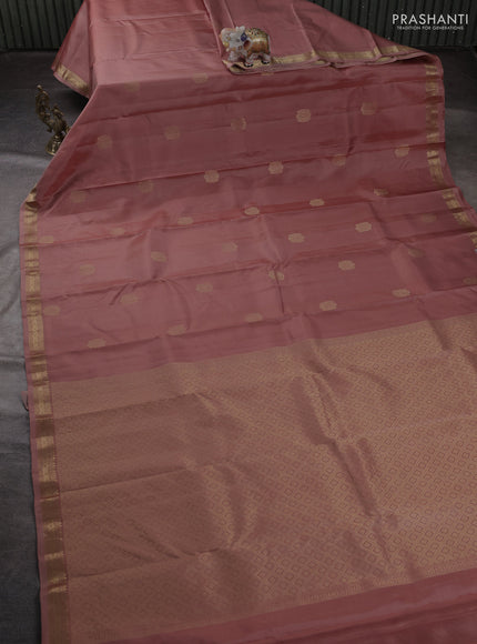 Pure kanchipuram silk saree dark peach with zari woven buttas and small zari woven border