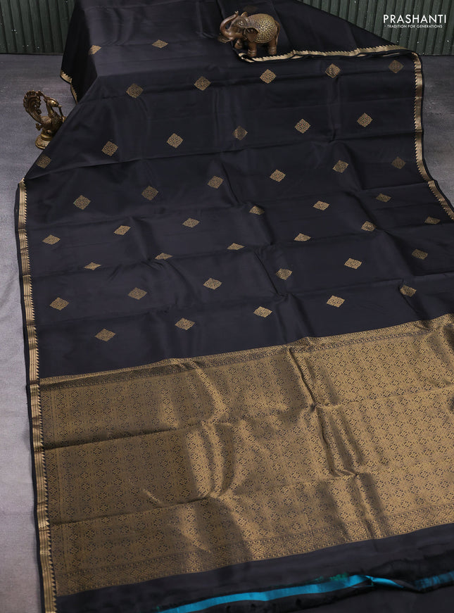 Pure kanchipuram silk saree black with zari woven buttas and small zari woven border