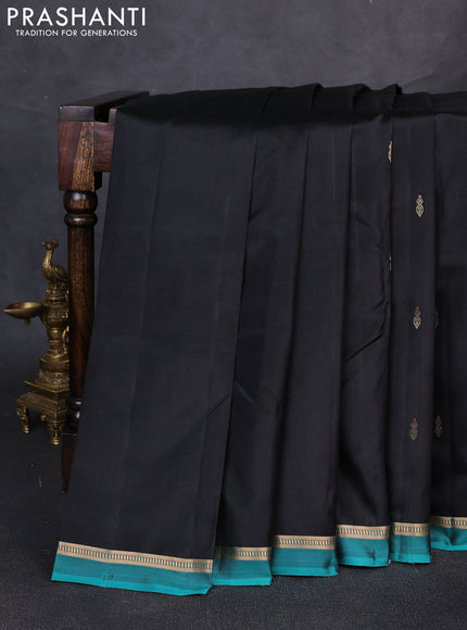 Pure kanchipuram silk saree black and teal green with zari woven buttas and zari woven simple border