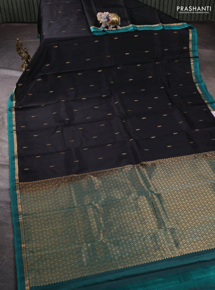 Pure kanchipuram silk saree black and teal green with zari woven buttas and zari woven simple border