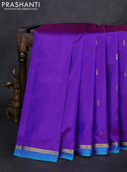 Pure kanchipuram silk saree purple and teal blue with allover zari woven buttas and zari woven simple border