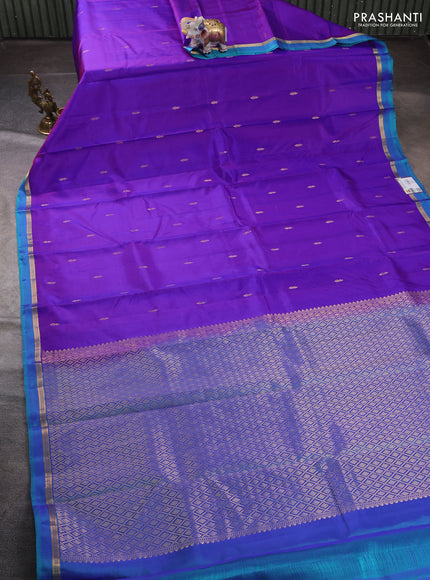 Pure kanchipuram silk saree purple and teal blue with allover zari woven buttas and zari woven simple border