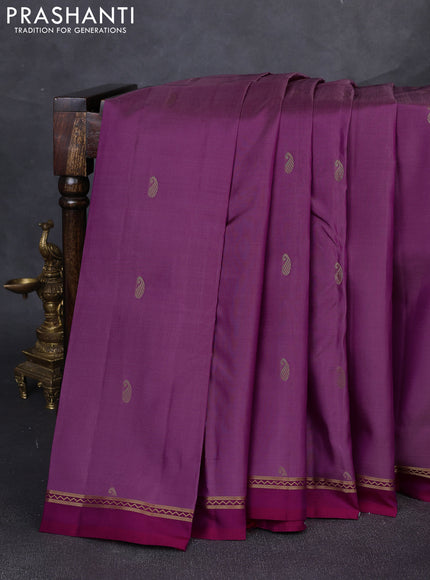 Pure kanchipuram silk saree pink shade and pink with allover paisley zari woven buttas and zari woven simple border