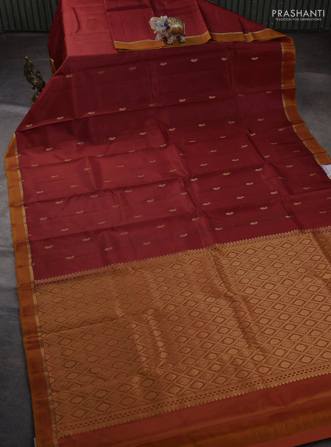 Pure kanchipuram silk saree maroon and mustard yellow with allover paisley zari woven buttas and zari woven simple border