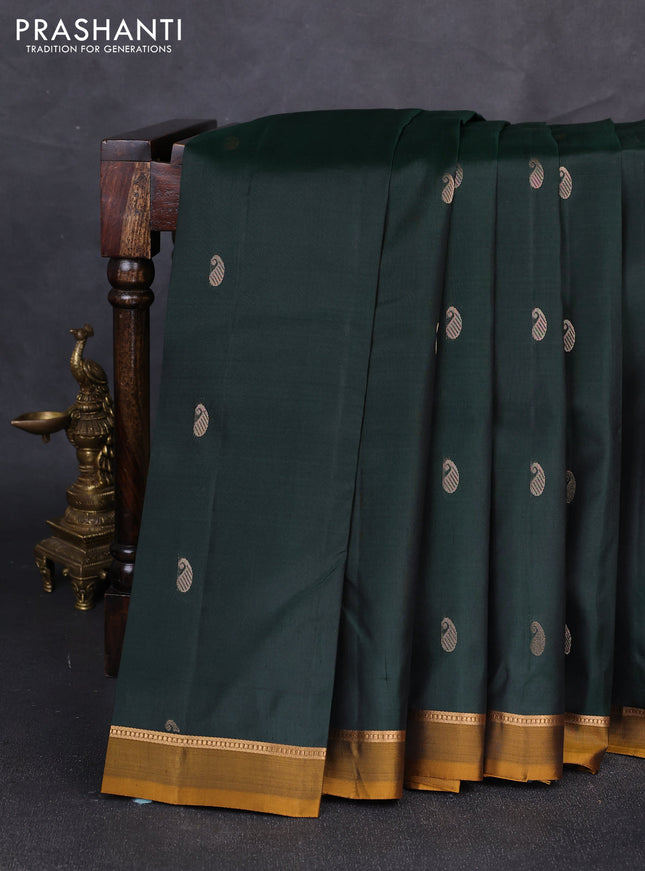 Pure kanchipuram silk saree bottle green and mustard yellow with allover zari woven buttas and zari woven simple border