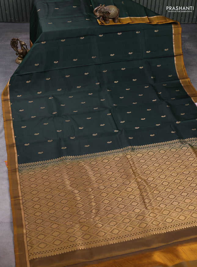 Pure kanchipuram silk saree bottle green and mustard yellow with allover zari woven buttas and zari woven simple border