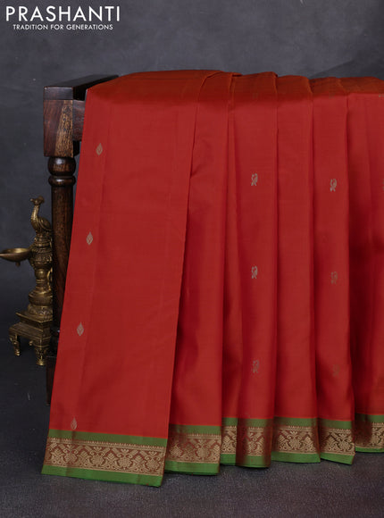 Pure kanchipuram silk saree orange and light green with zari woven buttas and small zari woven border