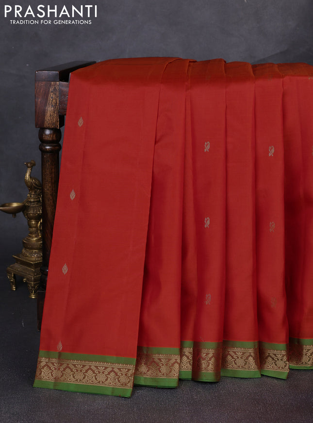 Pure kanchipuram silk saree orange and light green with zari woven buttas and small zari woven border