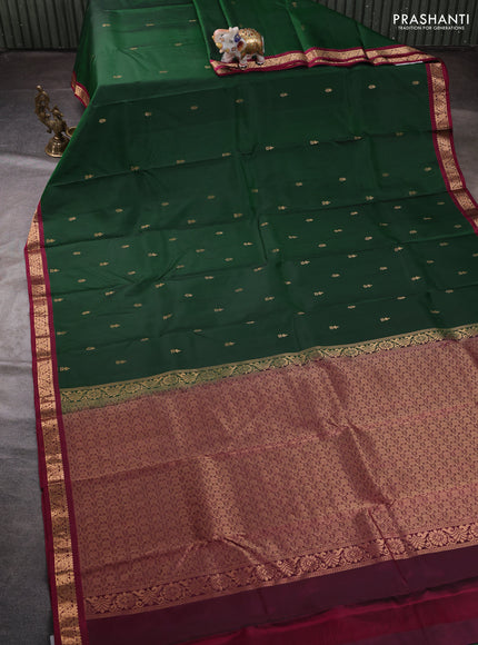 Pure kanchipuram silk saree green and magenta pink with zari woven buttas and small zari woven border